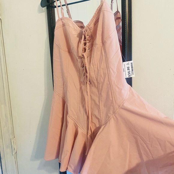 Dresses & Skirts - Brand new mauve pink dress with tie up straps.